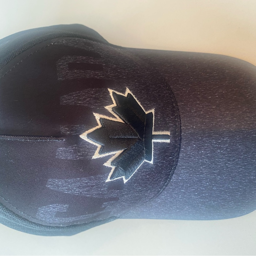 Robin Ruth Black Cap with Logo never worn